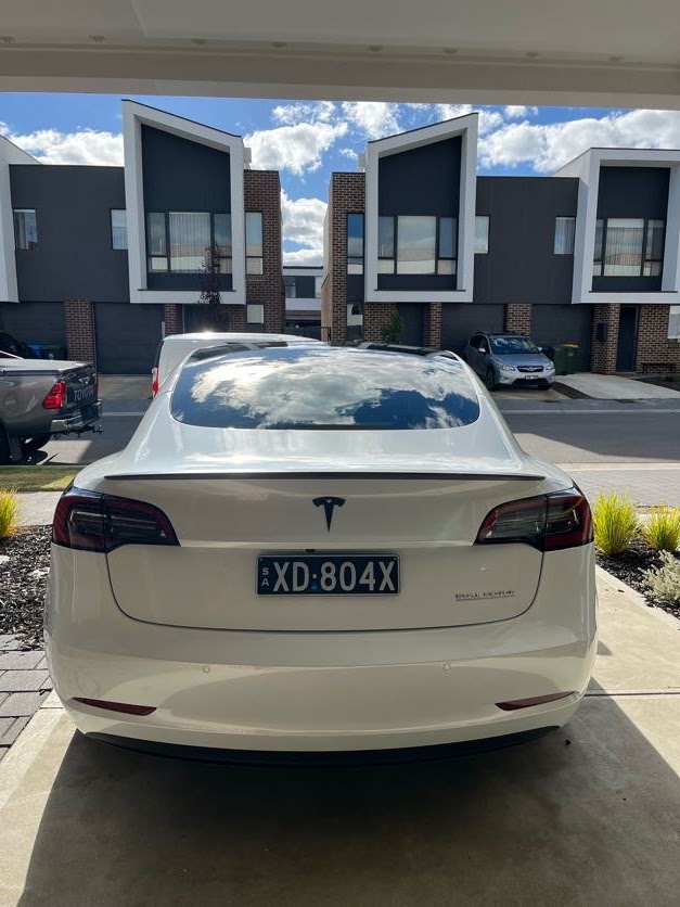 White Tesla Model 3 after ceramic coating